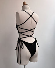 CROSSED BODY BINDING