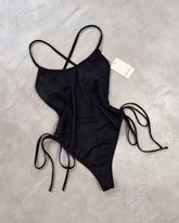 CROSSED BODY BINDING