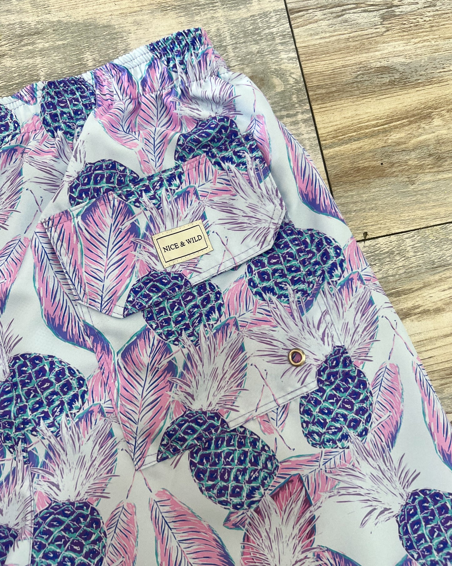 PANTALONCINI VIOLA CON ANANAS