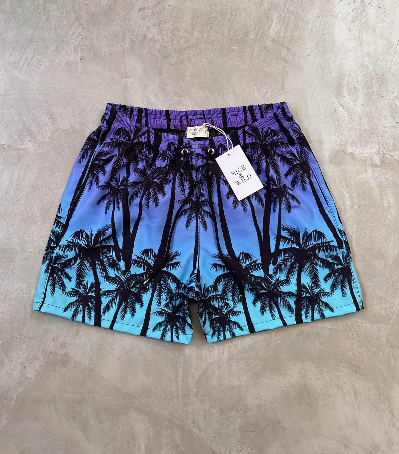 PANTALONCINI VIOLA CON PALMA