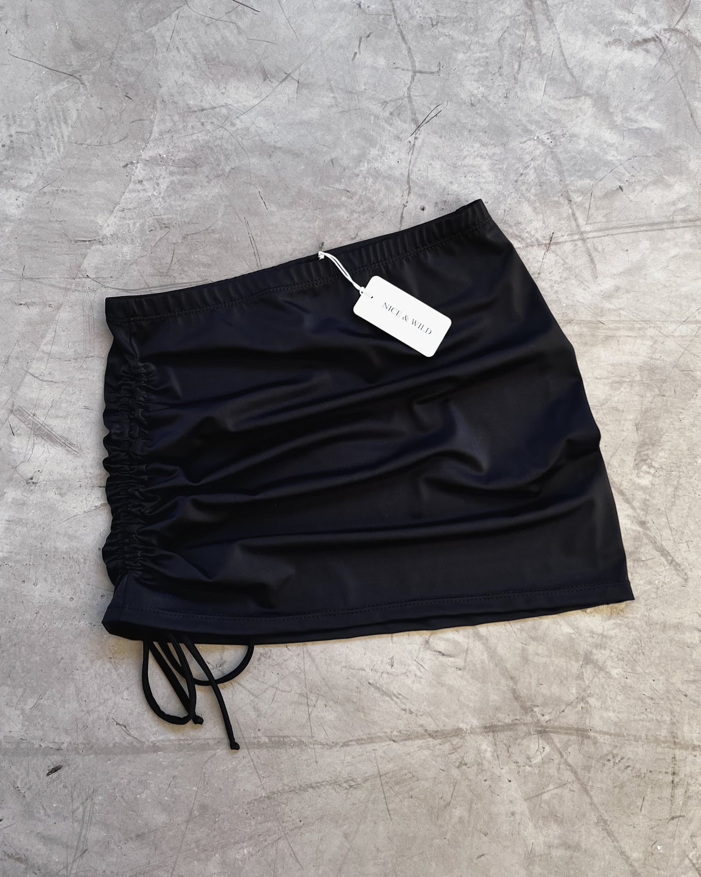 GONNA IN TESSUTO BIKINI NERO