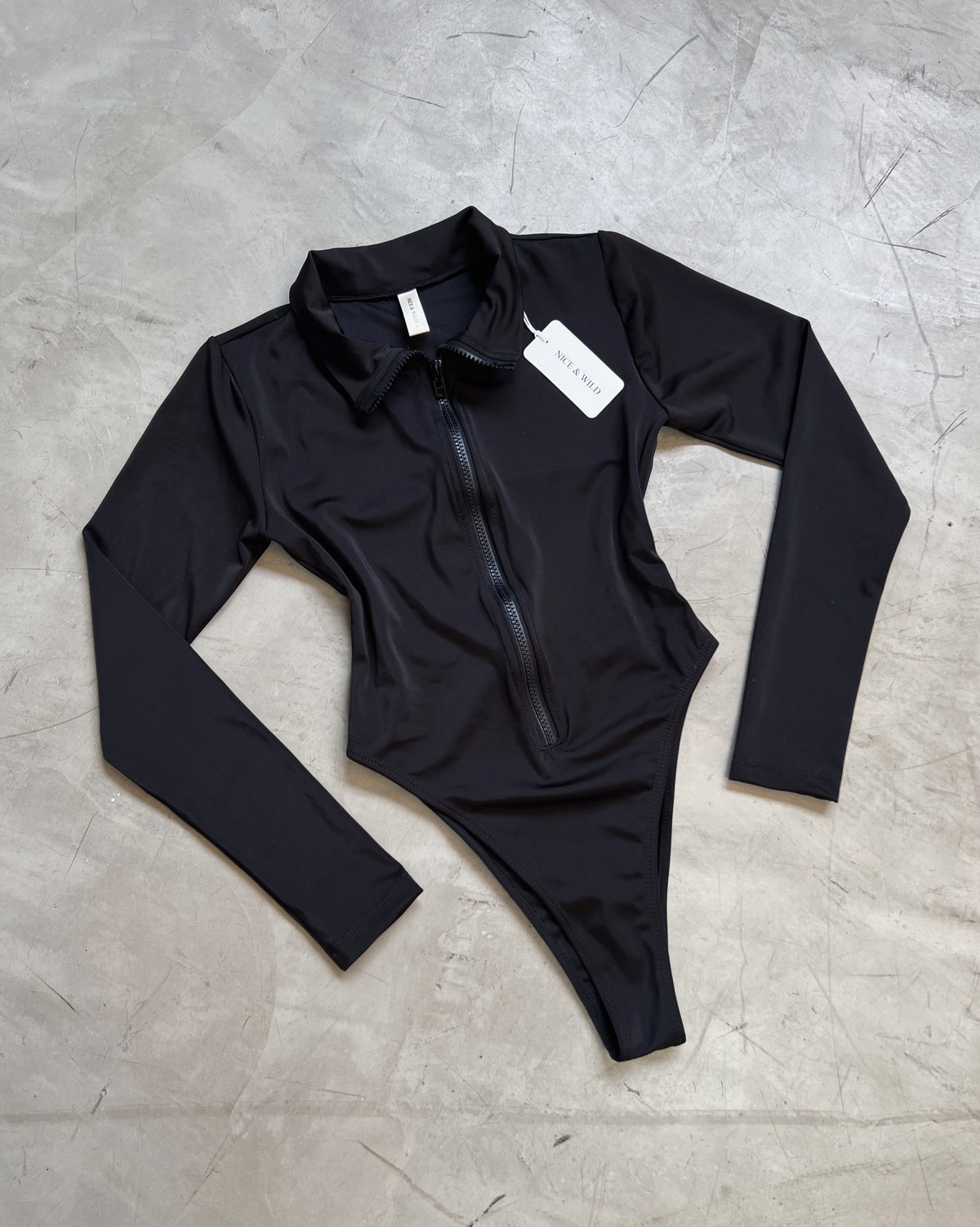 BLACK ZIPPER BODYSUIT