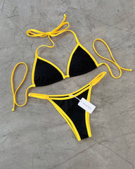 BIKINI TRIÁNGULO NEGRO SESGO AMARILLO