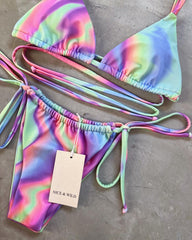 Candy-tanned bikini + mesh skirt