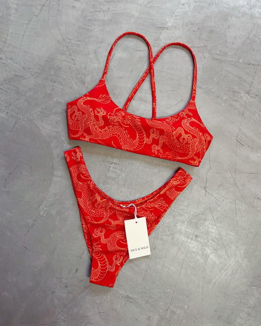 Bikini incrociato con draghi arancioni + gonna in rete