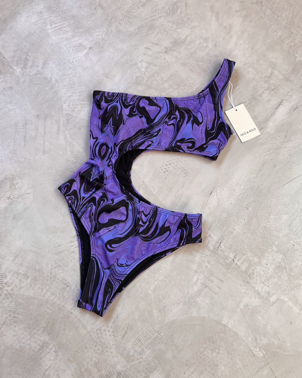 ASYMMETRICAL BODYSUIT WITH PURPLE STREAKING