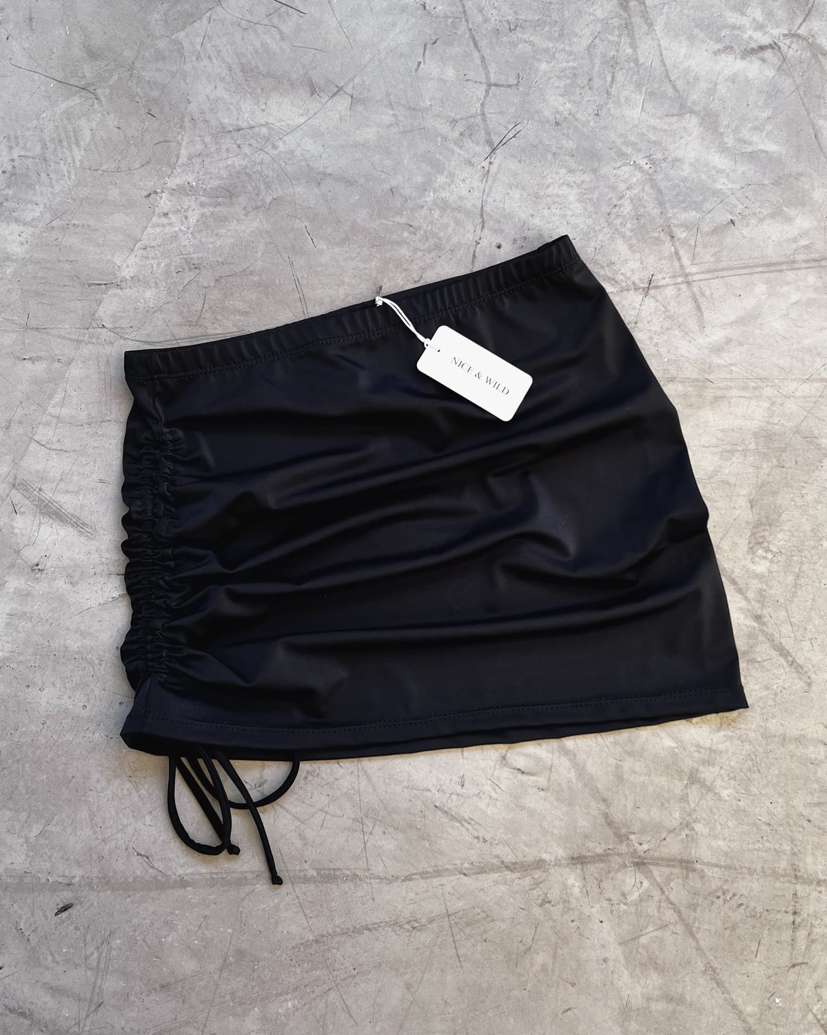 FALDA TELA BIKINI NEGRO